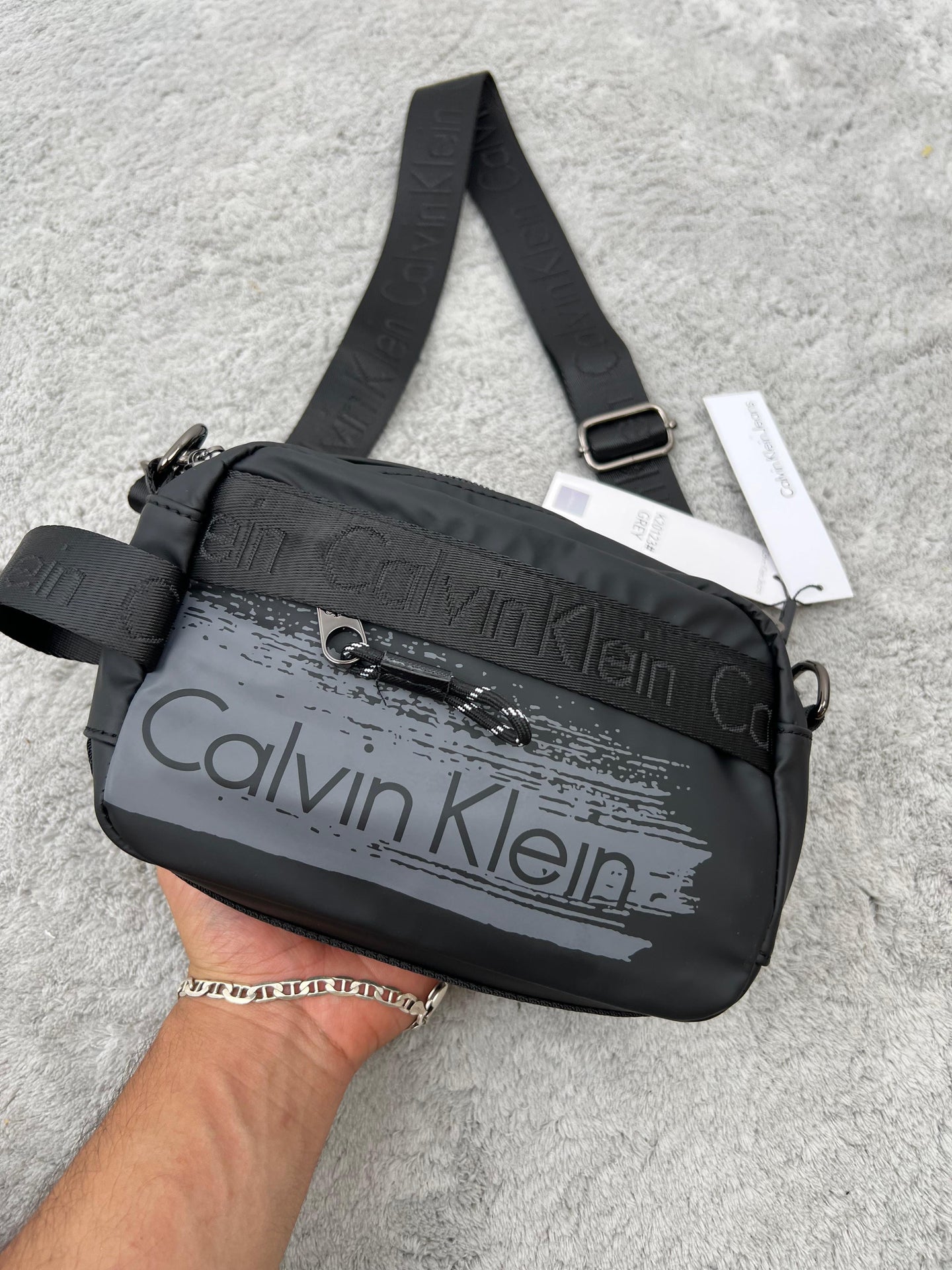 BANDOLERA -  CALVIN KLEIN