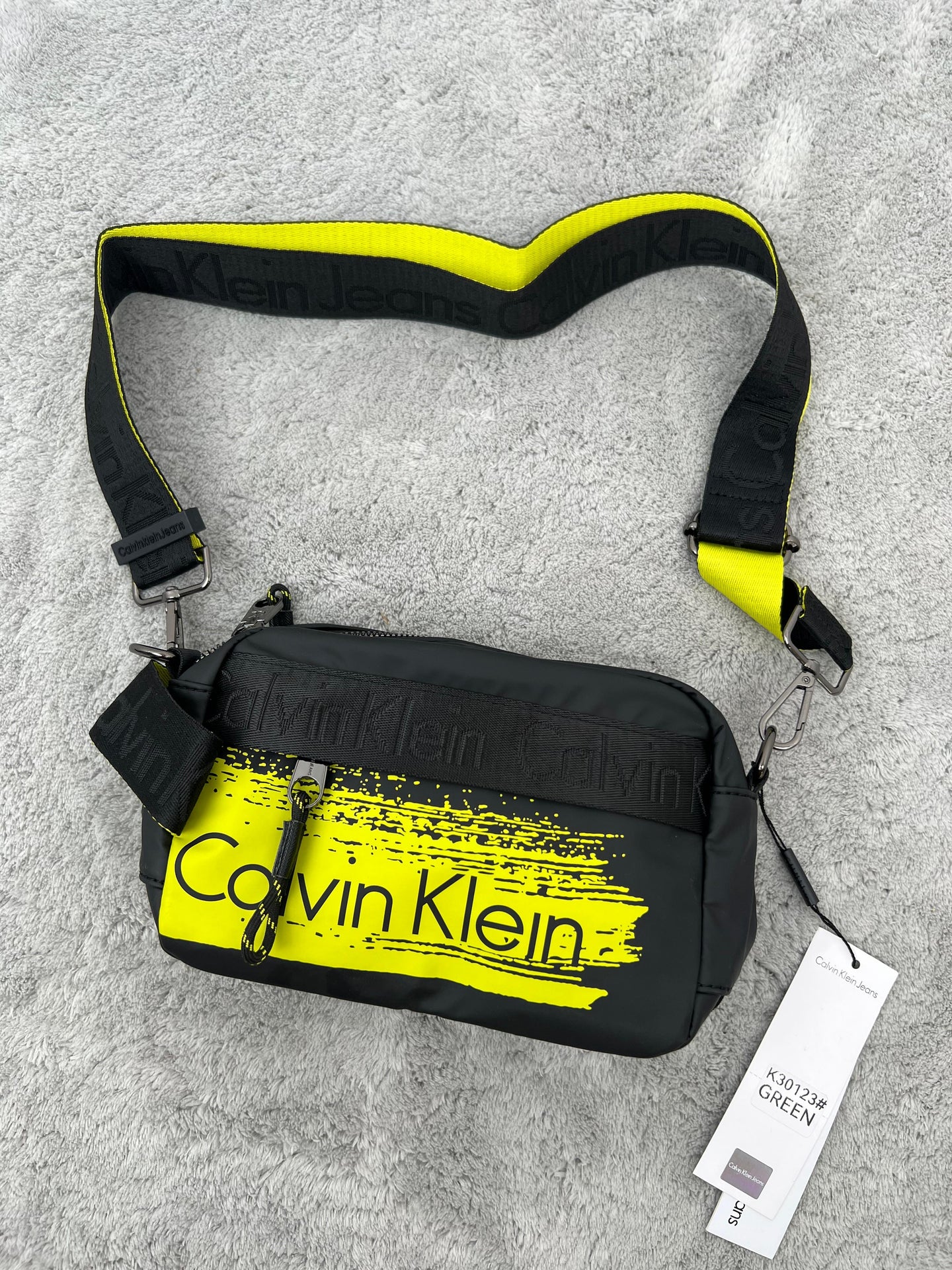 BANDOLERA -  CALVIN KLEIN